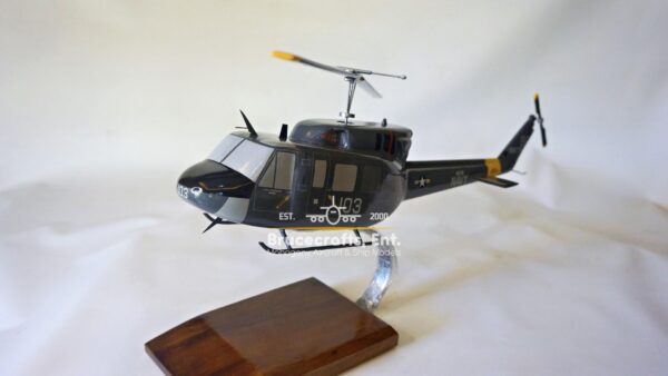 Model of UH-1N Twin Huey US NAVY 103 Aircraft with detailed craftsmanship.